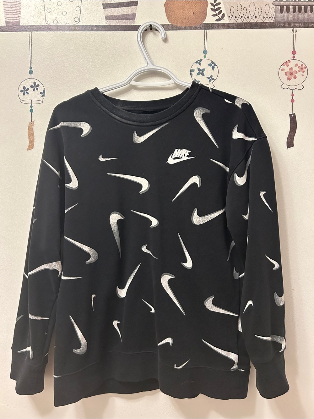 Nike Black Crewneck Sweatshirt with White Swoosh Pattern